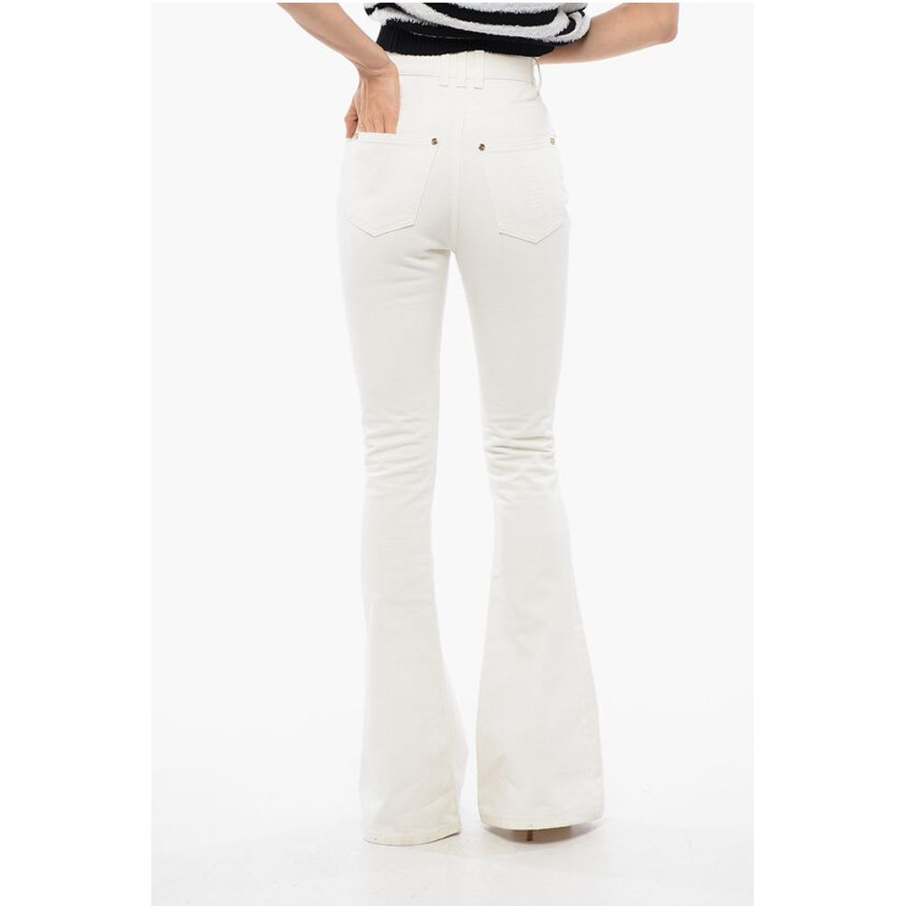 Balmain Flared-leg Denims with Jewel Buttons