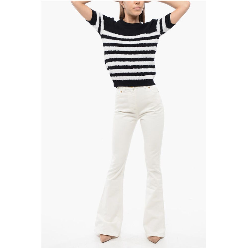 Balmain Flared-leg Denims with Jewel Buttons